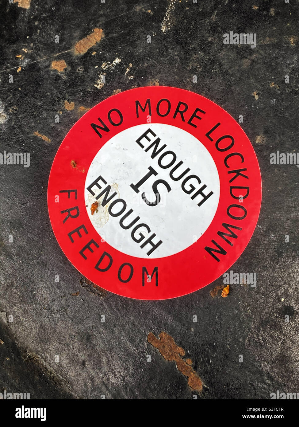 Enough is Enough. NO MORE LOCKDOWNS. Sticker in an English town. The pandemic is destroying people. It’s time to get out and be normal again. Photo Credit ©️ COLIN HOSKINS. - Smartphone Captured Stock Image