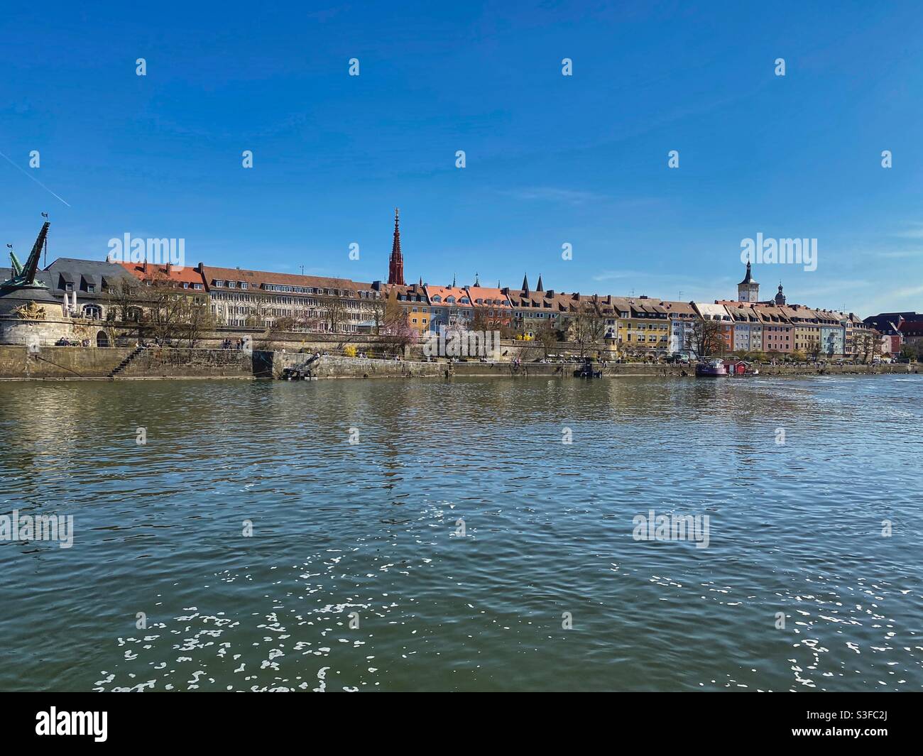 River Main and colorful houses in the historical center of Würzburg, Germany. - Smartphone Captured Stock Image