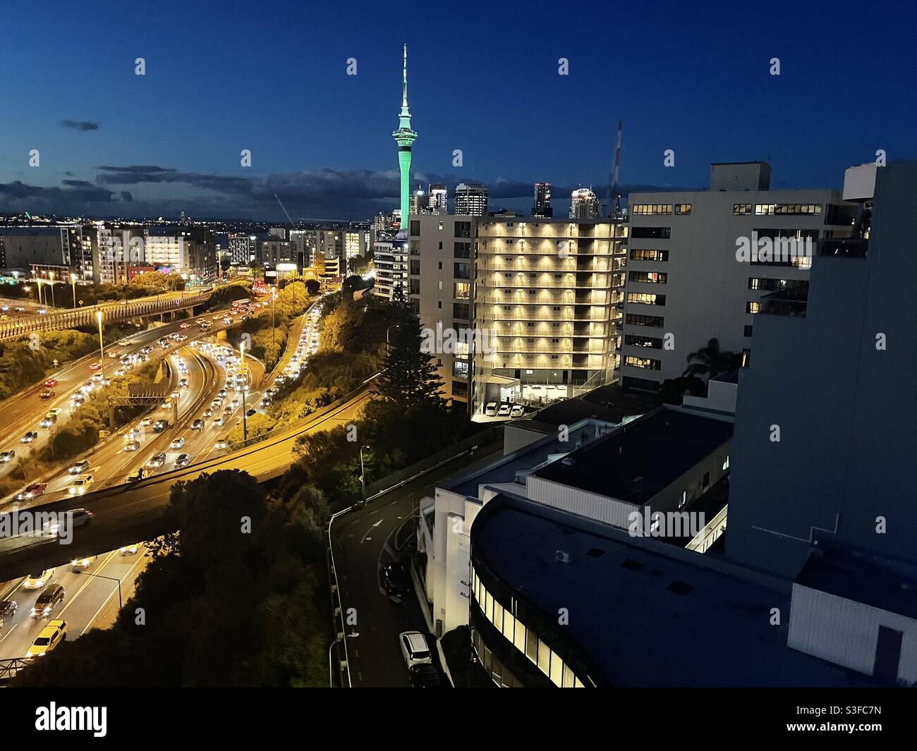 The Sky Tower in Auckland lit up green for the Muslim festival of Zeus - Smartphone Captured Stock Image