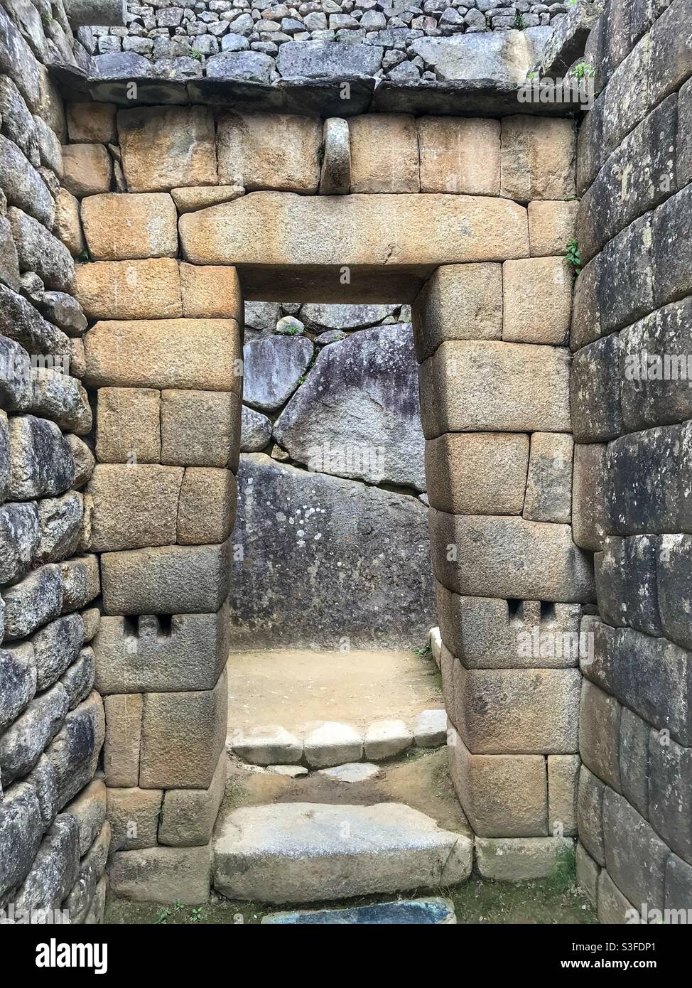 Stone doorway at Machu Picchu, Sacred Valley, Peru Stock Photo