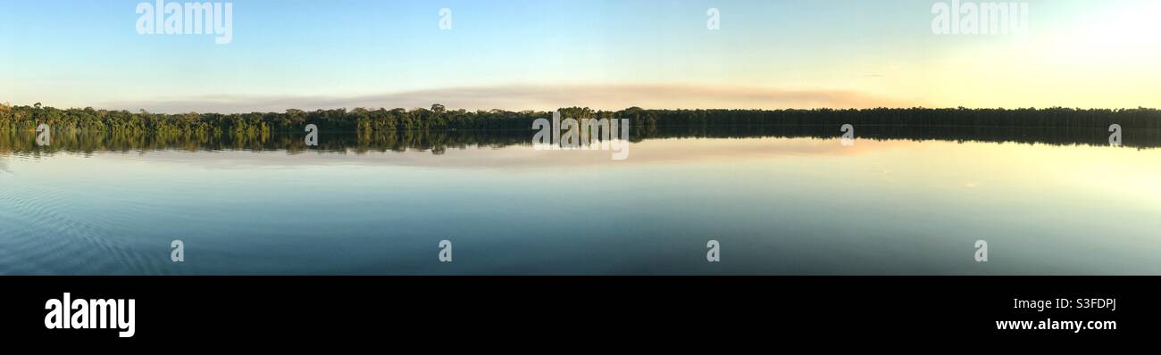 Panoramic sunset view of Lake Sandoval in the Peruvian Amazon - Smartphone Captured Stock Image