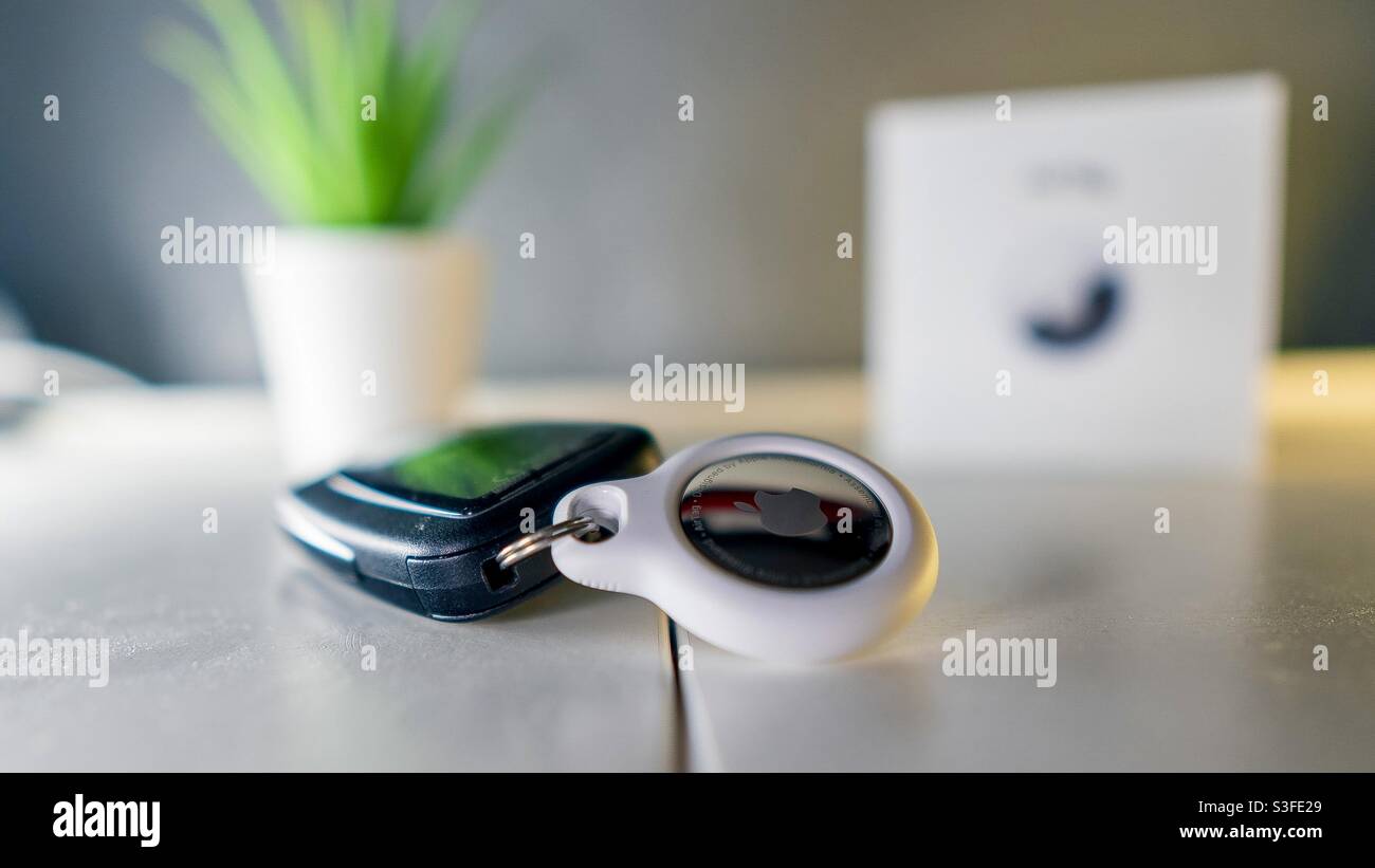 Apple Airtag tracker attached to car keys Stock Photo Alamy