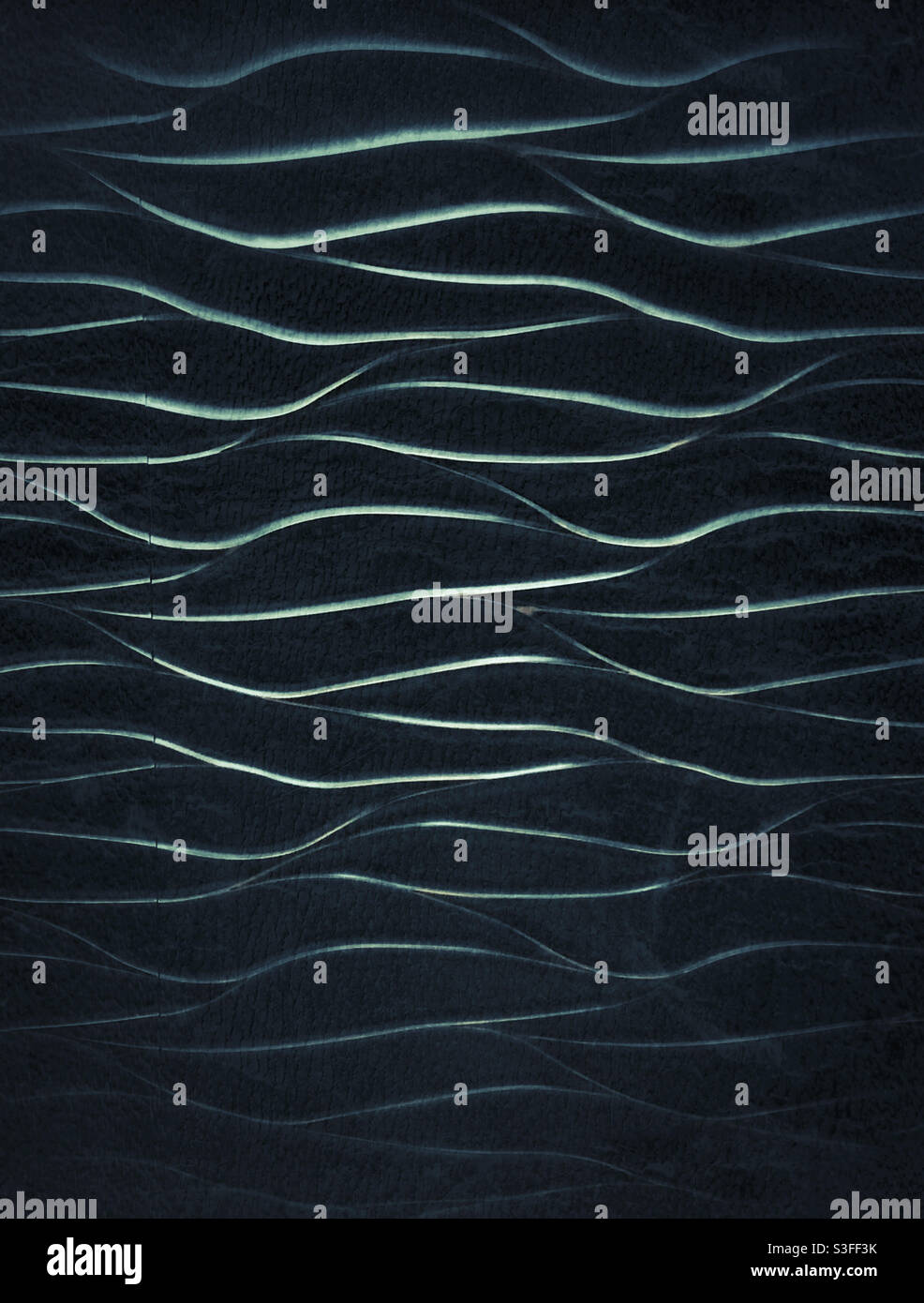 Textured blue metallic-style wall. Stock Photo