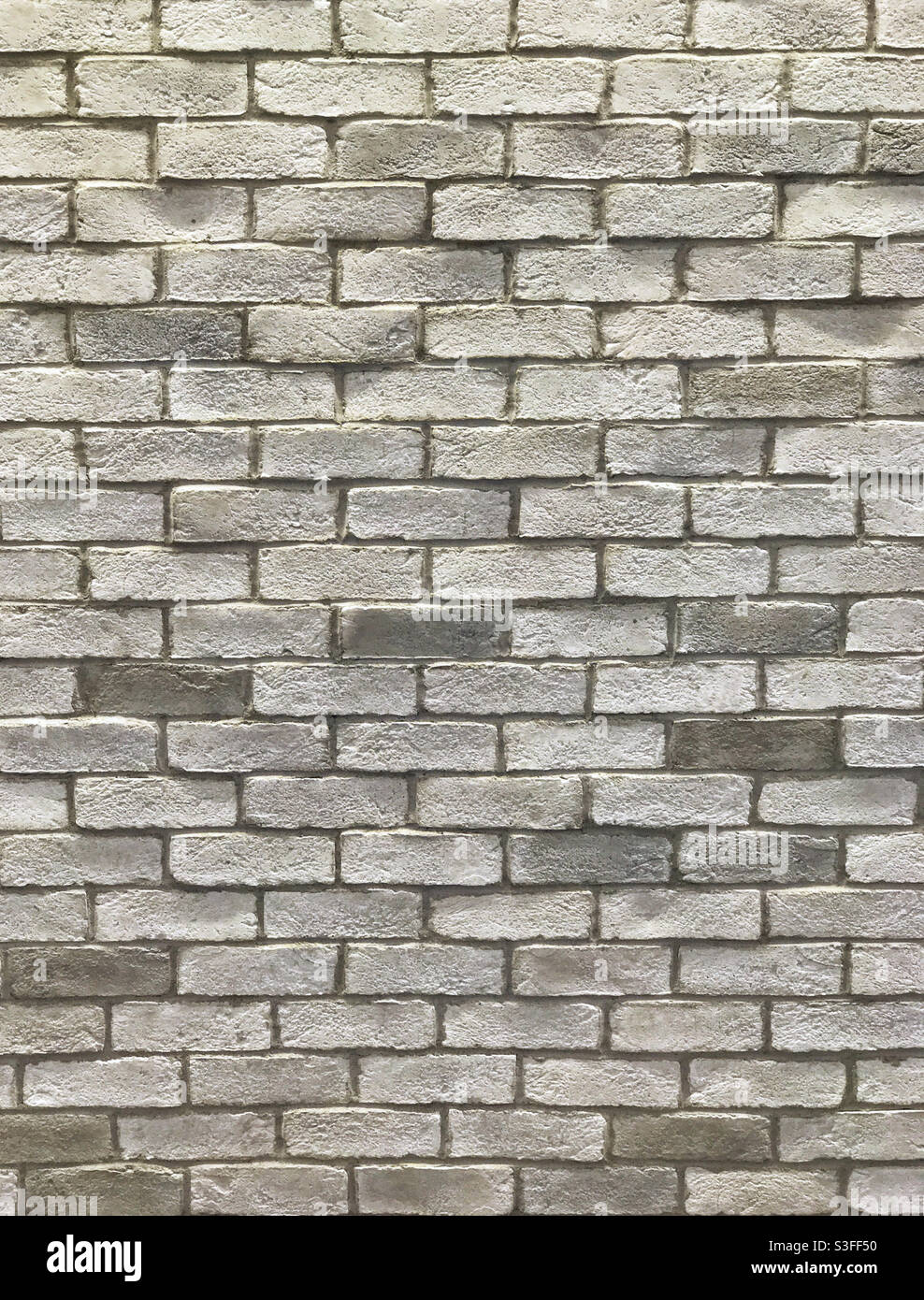 Uneven lightgrey brick wall Stock Photo Alamy