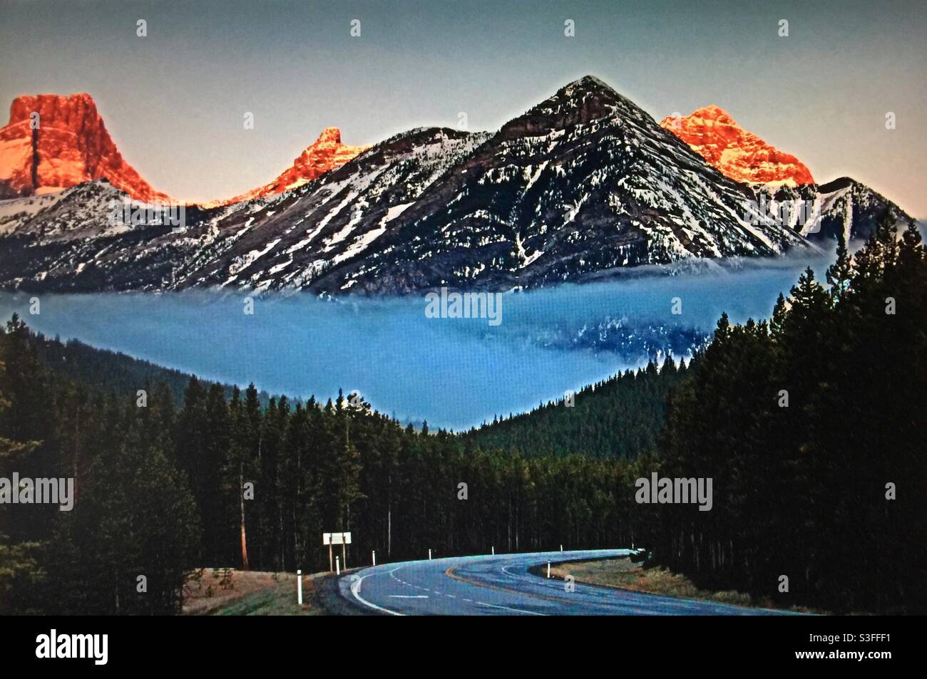 Sunrise, Kananaskis Country, Canadian Rockies, fog  in the mountains - Smartphone Captured Stock Image
