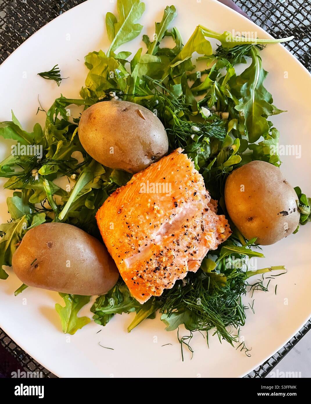 Close Up of Grilled Salmon and New Potato Entree,  USA - Smartphone Captured Stock Image
