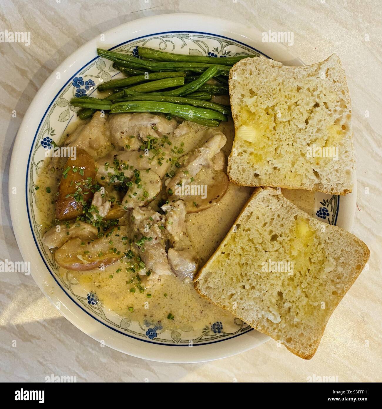 OvenBaked Normandy Chicken & Apple Casserole. 21.05.2021 Stock Photo