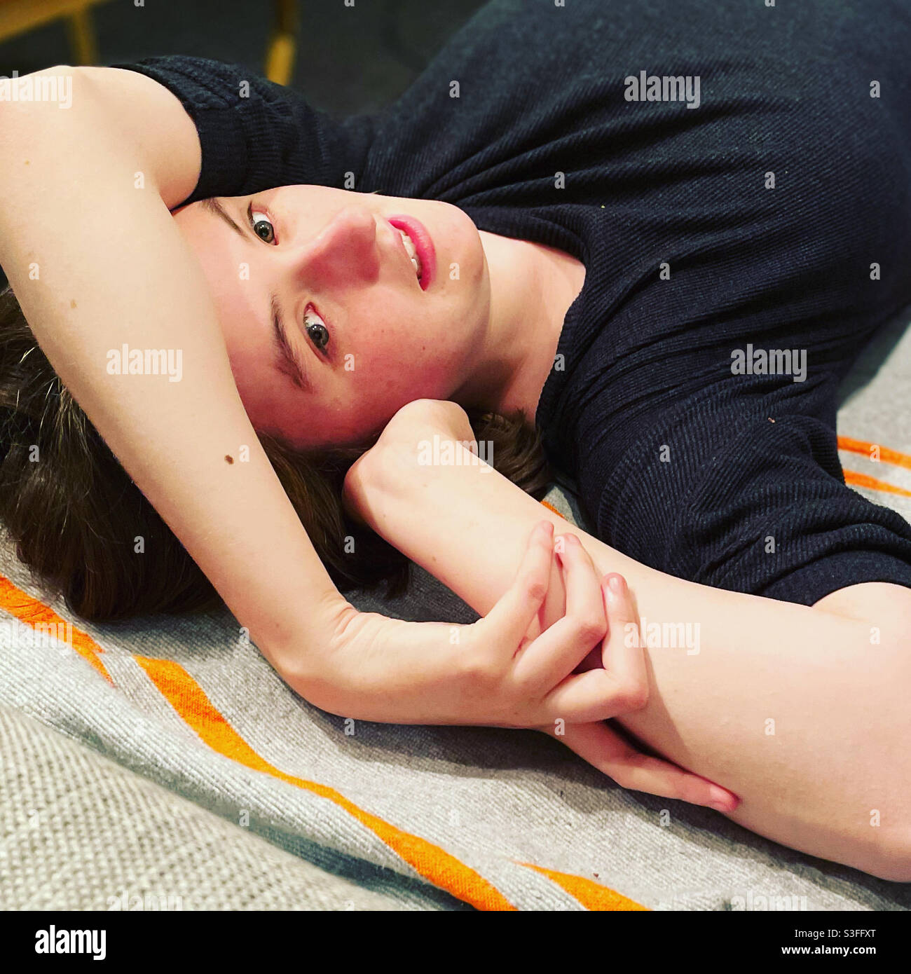 Thoughtful young woman - Smartphone Captured Stock Image