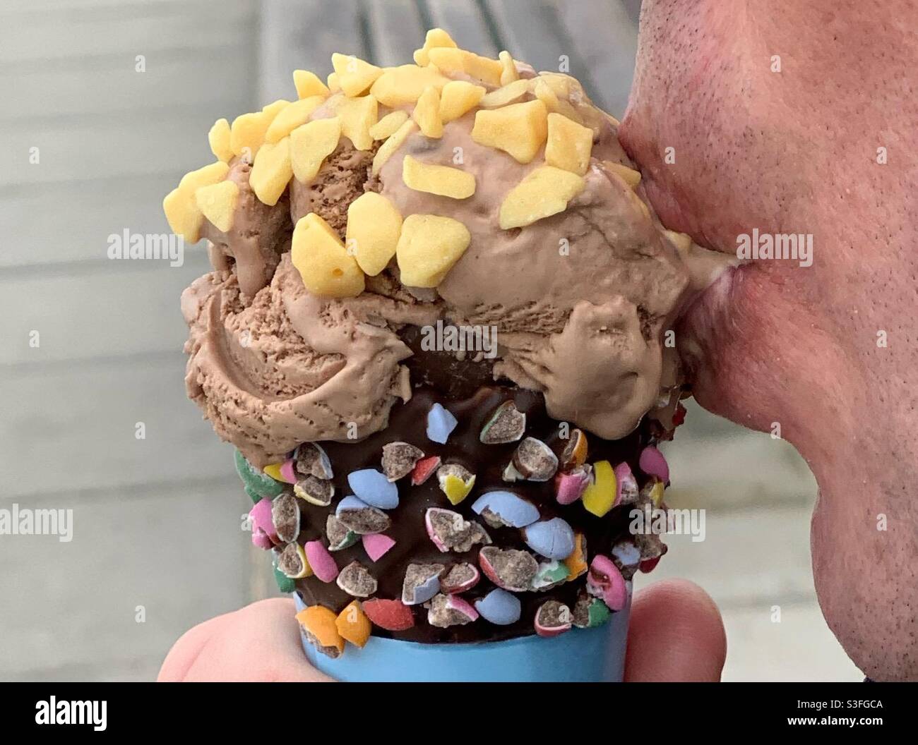 Man eating an ice cream. - Smartphone Captured Stock Image