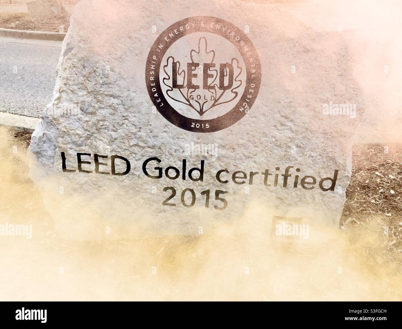 LEED Gold certified. Leadership in energy and environmental design. Green buildings. The LEED program is a global environmental certification program for building projects. Stock Photo