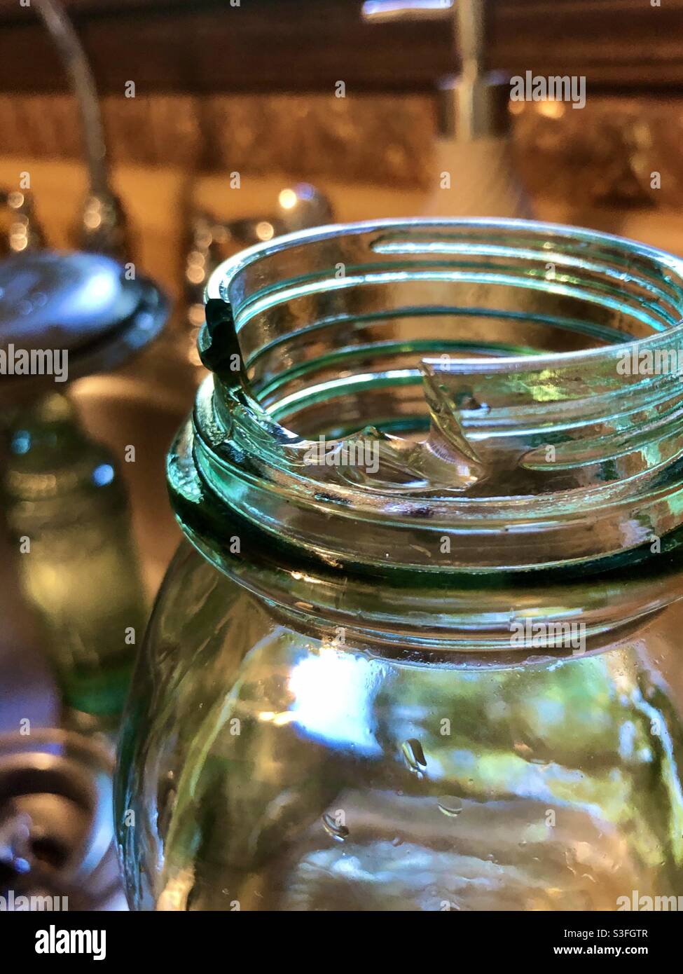 Broken glass kitchen Stock Photo