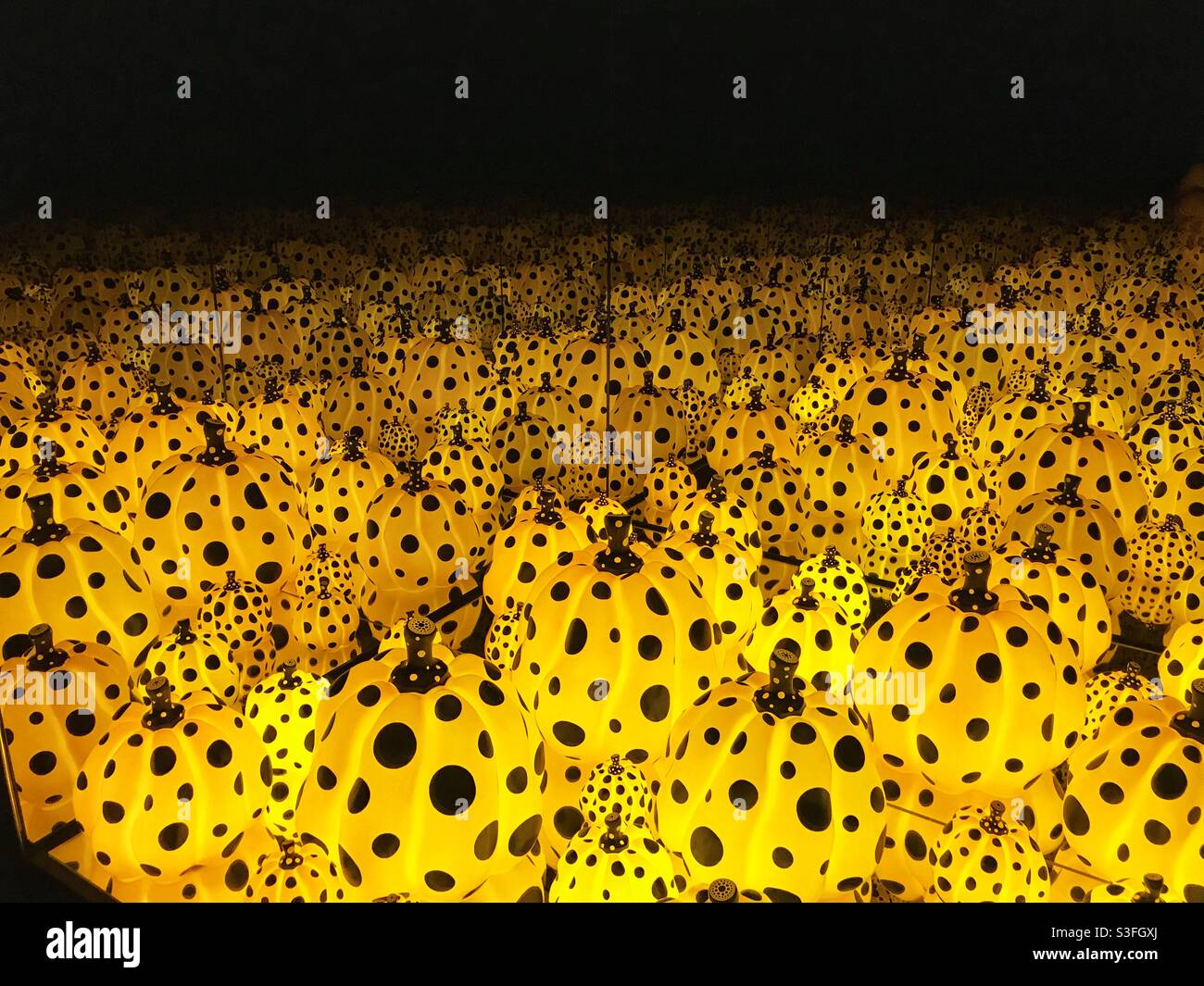 Inside an infinity room at the Kusama Museum, Tokyo Stock Photo