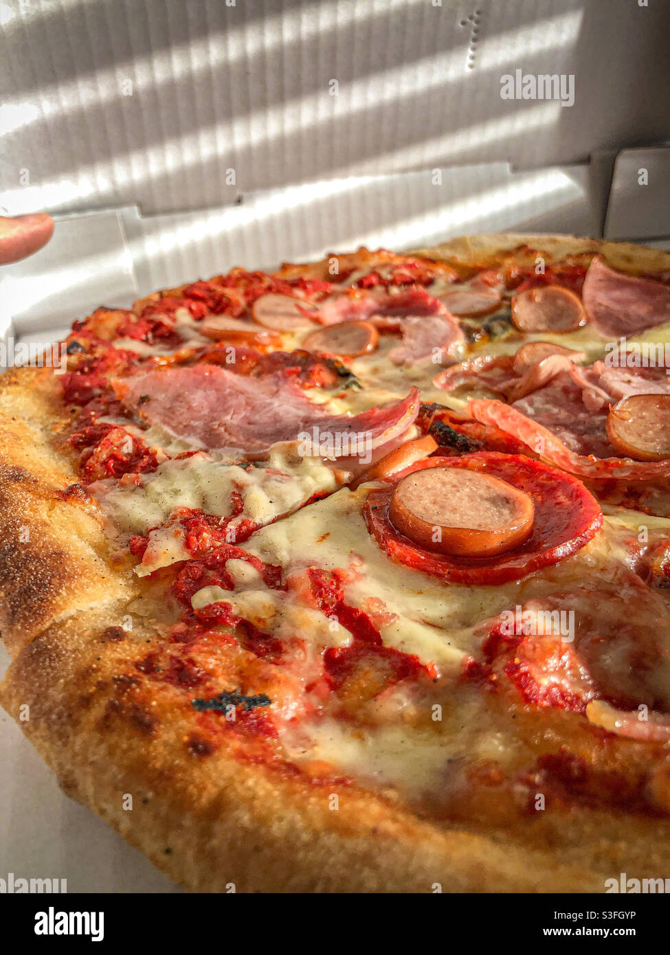 Pepperoni and sausage pizza Stock Photo Alamy
