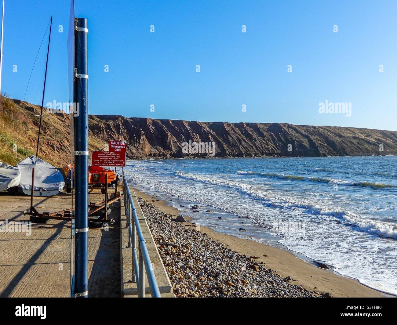 Cliffs at Filey from Cobble Landing tide coming in Stock Photo