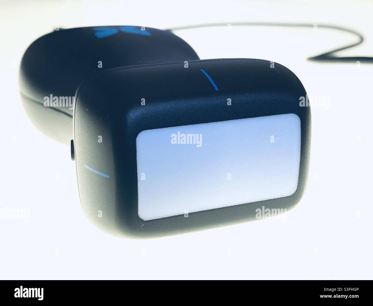 Butterfly IQ, a handheld point-of-care ultrasound medical devise that can plug into an IOS device and is revolutionizing medical care by its ease of use and price point. - Smartphone Captured Stock Image