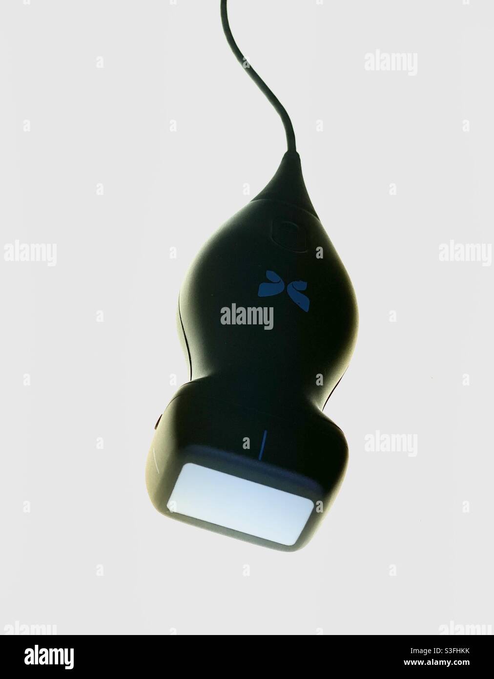 Butterfly IQ, a handheld point of care ultrasound that can plug into an IOS device. Popular among new generation physicians that need to do FAST exams, quick cardiac assessments due to its price point - Smartphone Captured Stock Image
