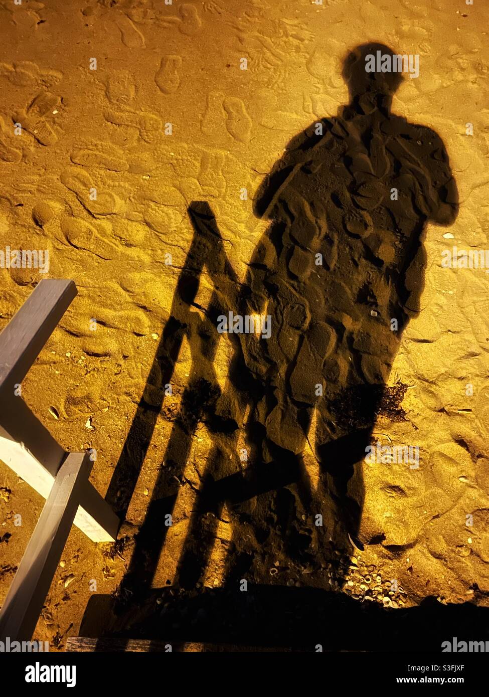 Shadow on the beach - Smartphone Captured Stock Image