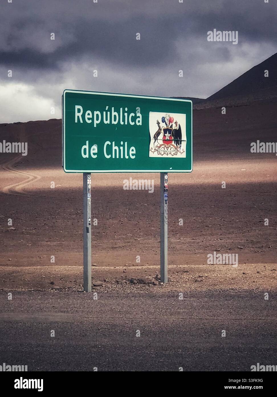 Sign at the border of Chile and Bolivia - Smartphone Captured Stock Image