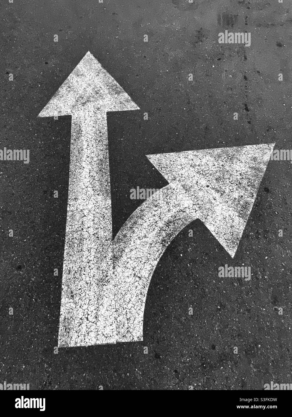 Arrows pointing up and to the right, in black and white - Smartphone Captured Stock Image