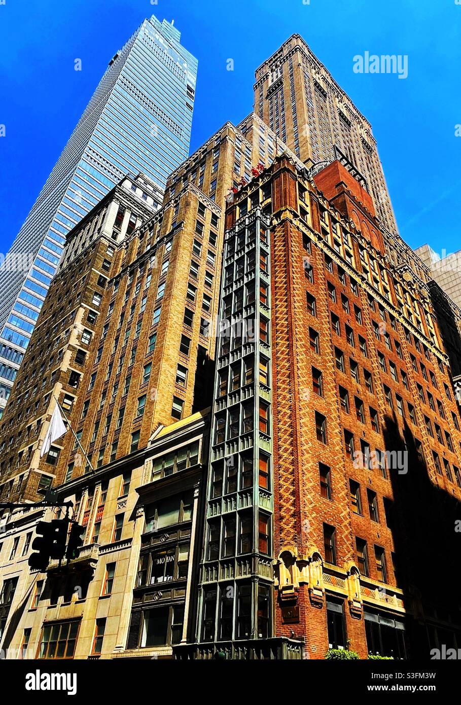 The super tall skyscraper One Vanderbilt towers over Midtown office buildings and hotels, NYC, USA - Smartphone Captured Stock Image