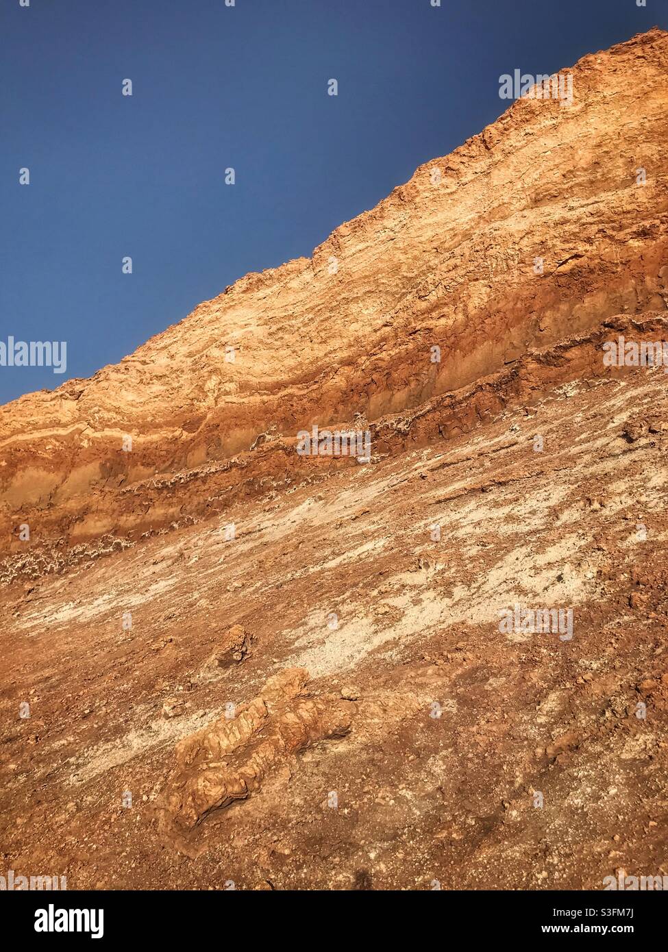 Rock wall in el Valle de la Luna or Valley of the Moon, San Pedro de Atacama, Chile - Smartphone Captured Stock Image