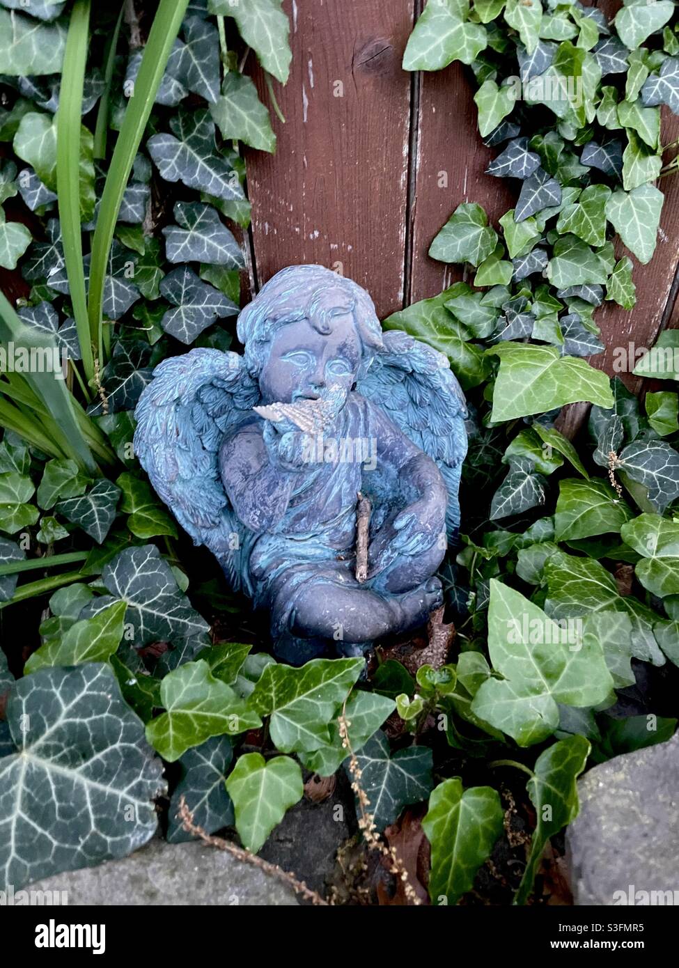 Angel boy statue Stock Photo Alamy