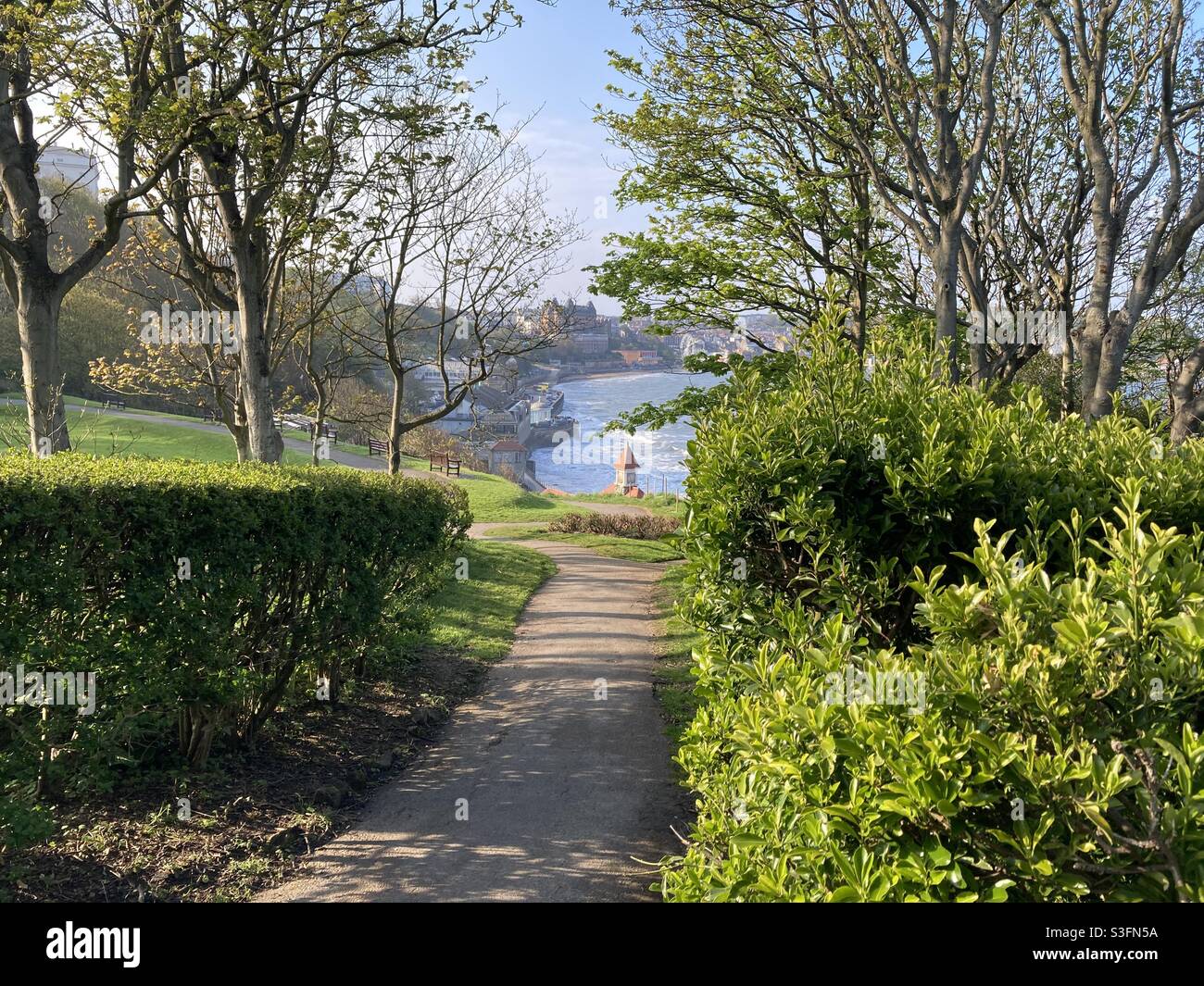 Pathway leading to the sea, Scarborough in the distance Stock Photo