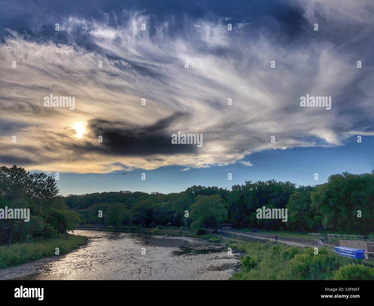 The Humber River in Toronto in the evening under a setting sun. - Smartphone Captured Stock Image