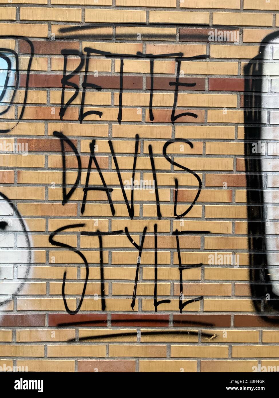 Bette Davis Style Graffiti on a Wall in Berlin - Smartphone Captured Stock Image