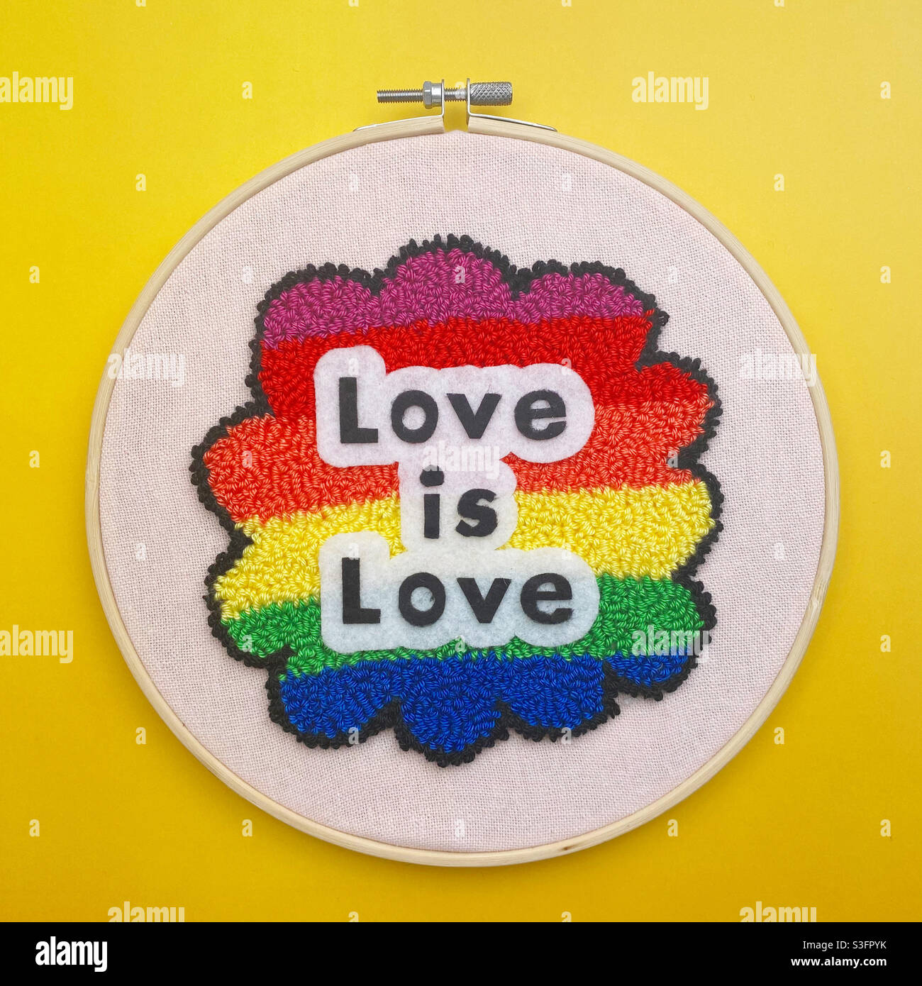Rainbow Love is love punch needle embroidery Stock Photo