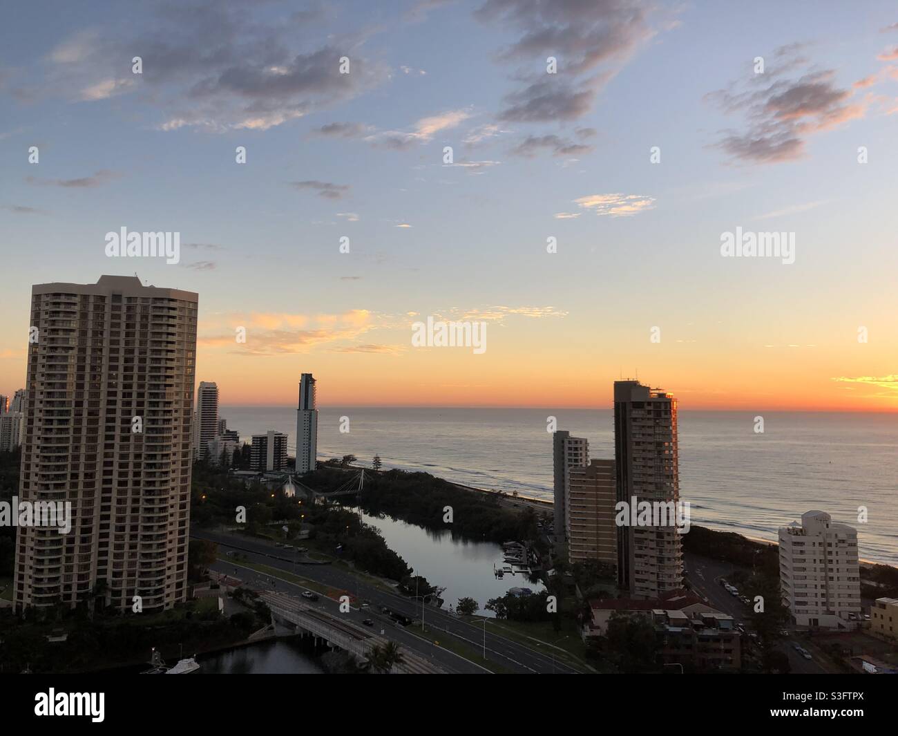 Sunset against the clear skies in Gold Coast, Queensland, Australia Stock Photo