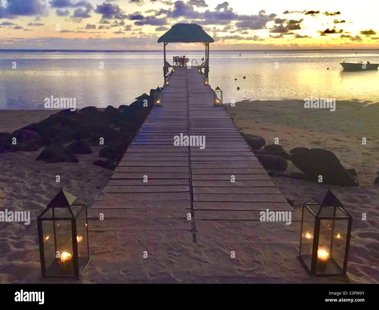 Romantic dinner on a Mauritius beach jetty Stock Photo Alamy