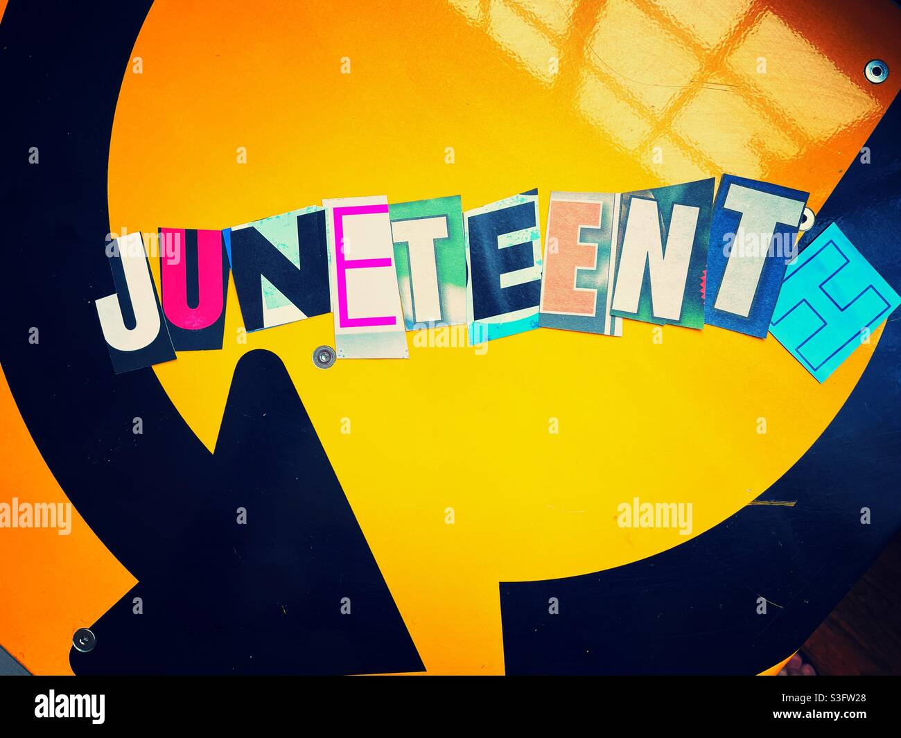 Juneteenth spelled out in colorful vibrant paper letters in the ransom note affect topography, USA - Smartphone Captured Stock Image