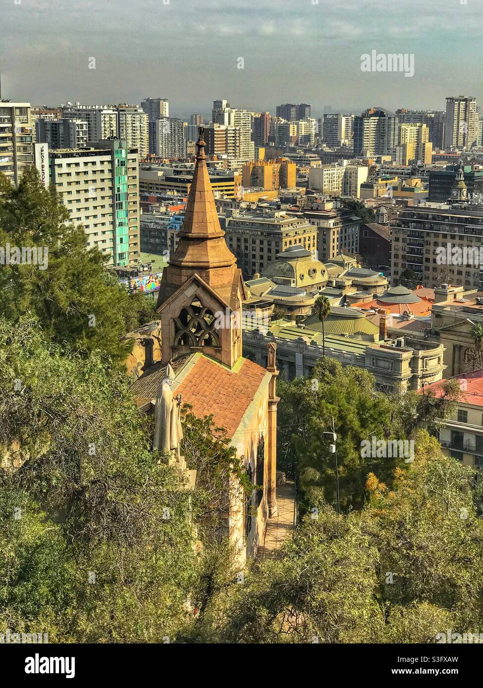 View of a church from a hilltop viewpoint in Santiago, Chile - Smartphone Captured Stock Image
