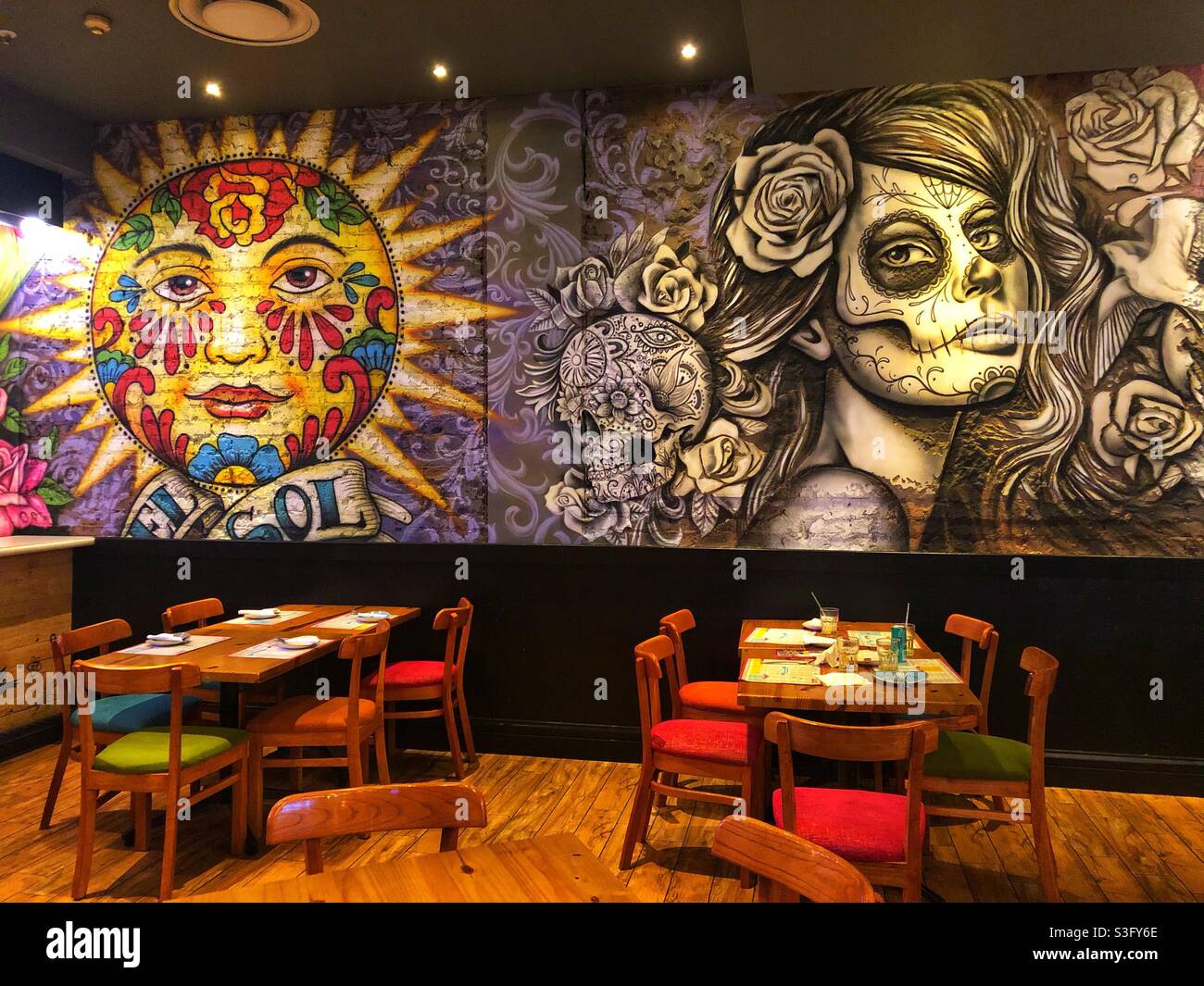 Day of the dead themed wall art in a Mexican restaurant Stock Photo Alamy