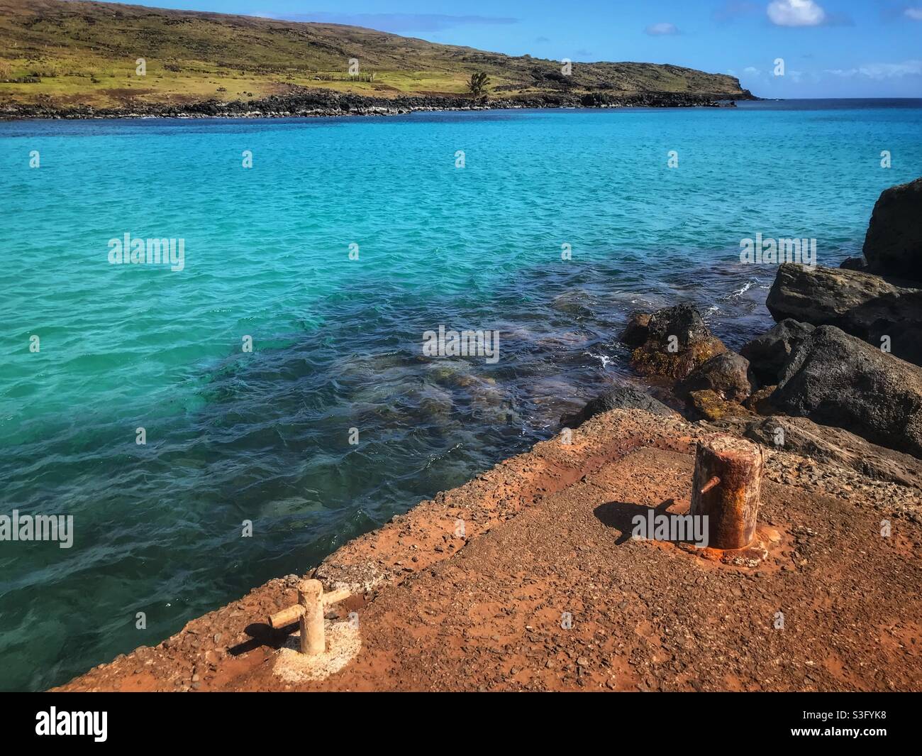 Rusty dock at Anakena Beach, Easter Island, Chile - Smartphone Captured Stock Image