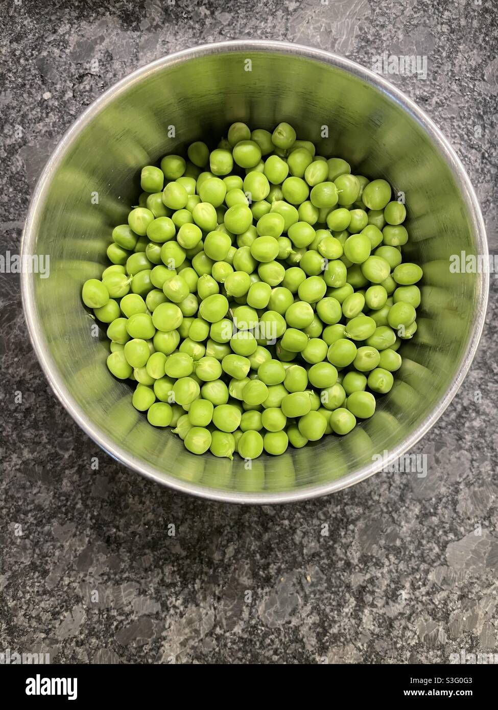 Fresh hulled peas in a bowl - Smartphone Captured Stock Image