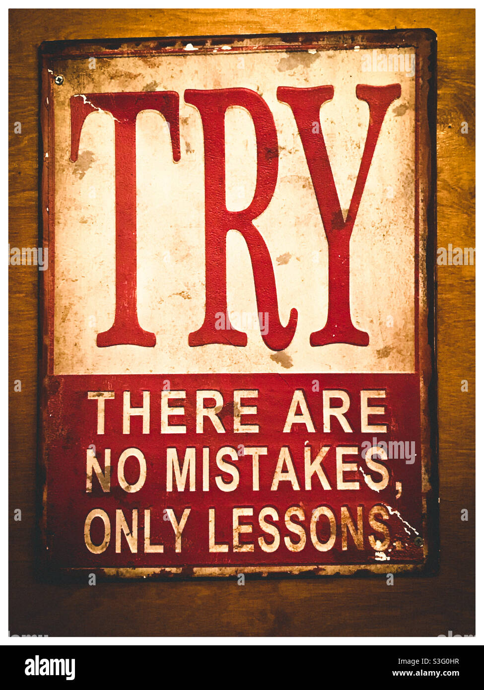 Metal motivational quote sign Stock Photo Alamy