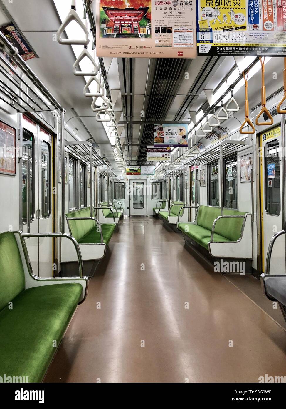 Empty Kyoto subway car, Japan. Empty public transport during COVID 19 pandemic. - Smartphone Captured Stock Image