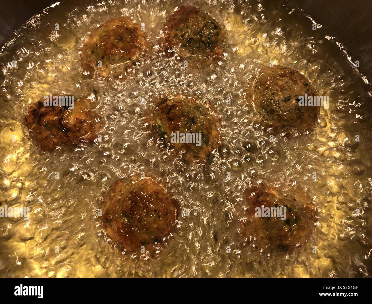 Deep frying Middle Eastern vegan dish falafel Stock Photo Alamy