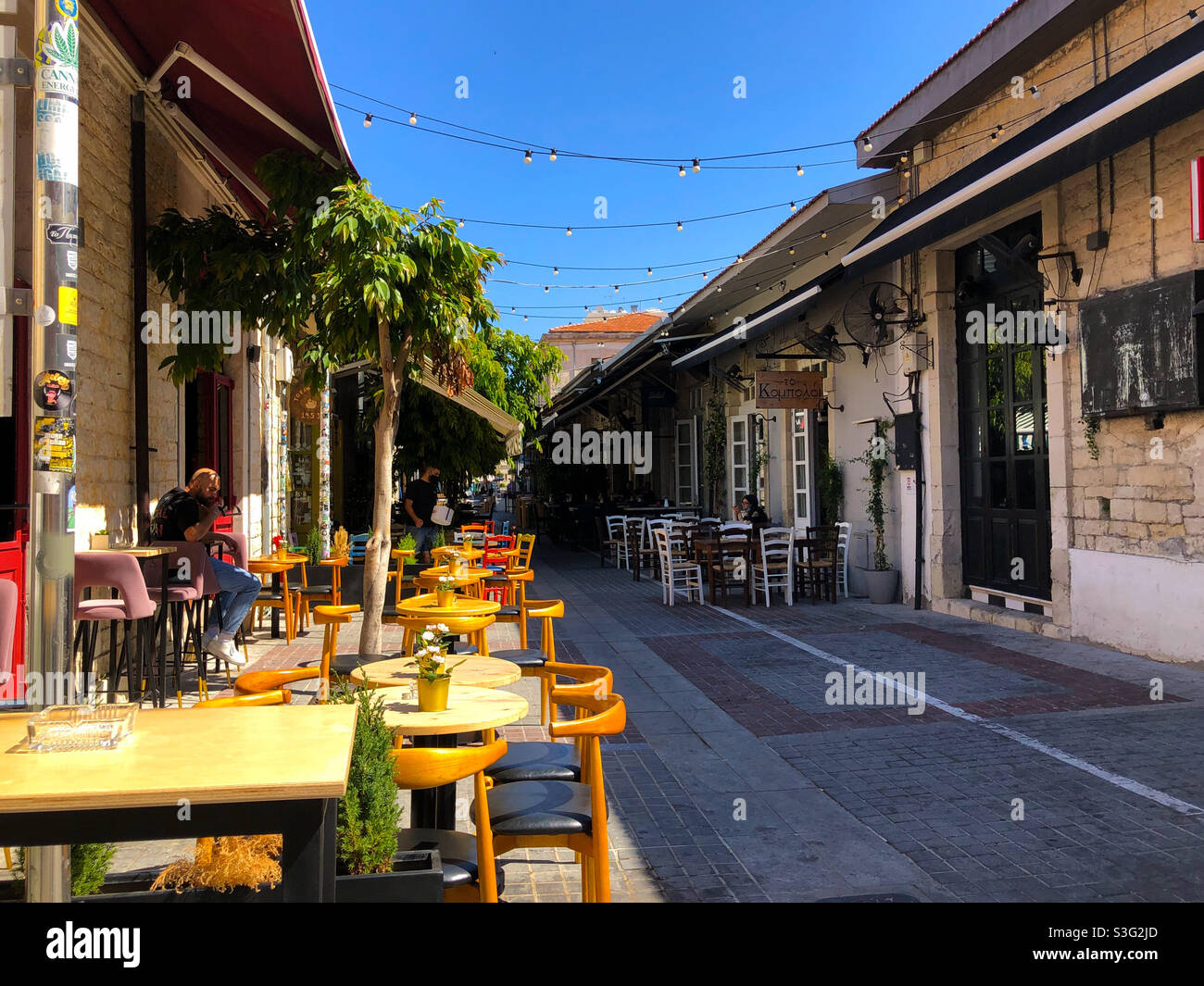 Street cafes in the Old Town section of Limassol, Cyprus - Smartphone Captured Stock Image Street cafes in the Old Town section of Limassol, Cyprus - Smartphone Captured Stock Image