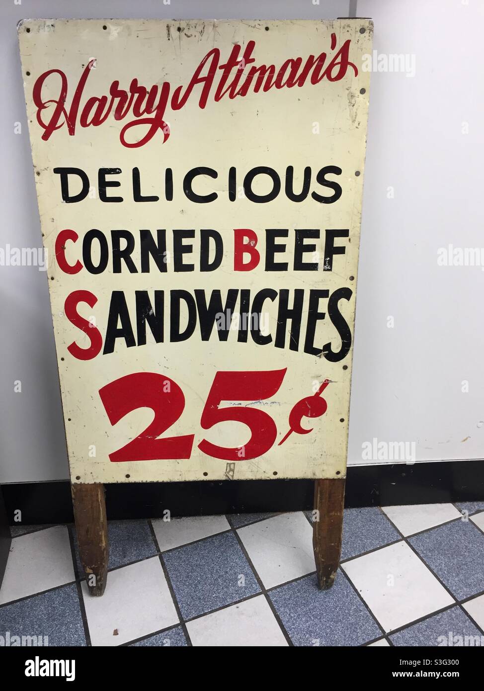 Sandwich board sigh advertising Harry Altman’s Delicious Corned Beef Sandwiches for $0.25. - Smartphone Captured Stock Image