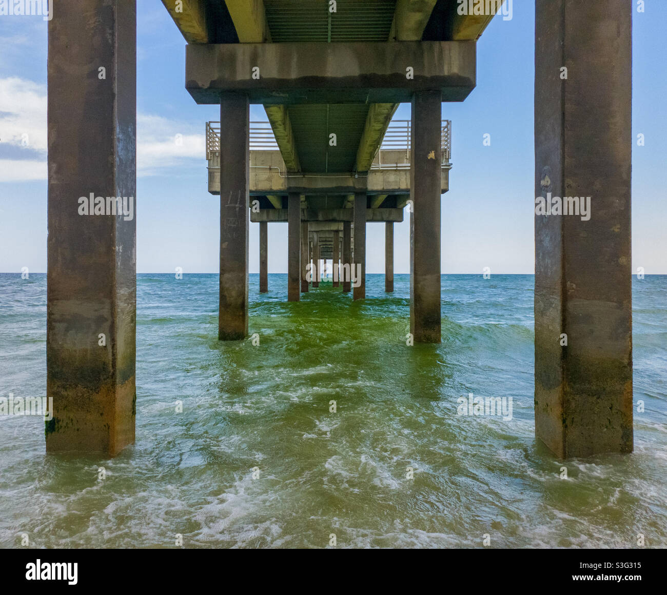Underneath a pier in Orange Beach, Alabama - Smartphone Captured Stock Image