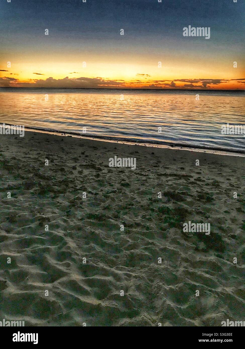 Sunset, Aitutaki lagoon, Cook Islands - Smartphone Captured Stock Image
