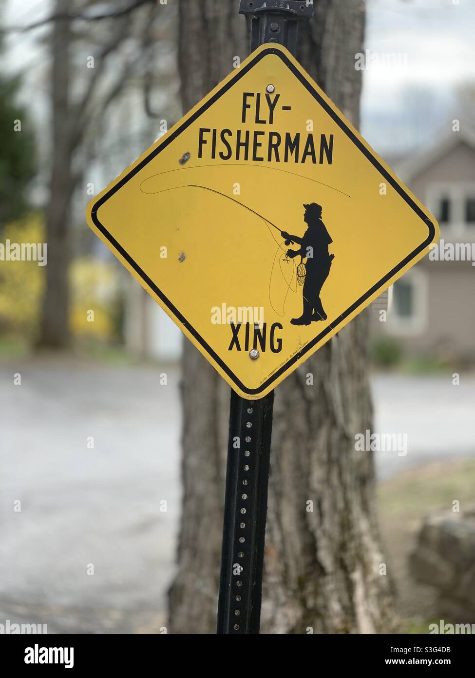 “Fly Fisherman XING” sign Stock Photo