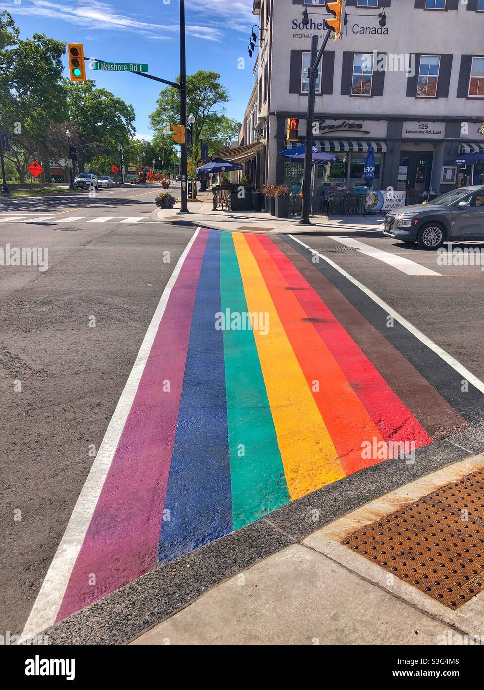 A rainbow crosswalk in Oakville, Ontario, Canada. Stock Photo