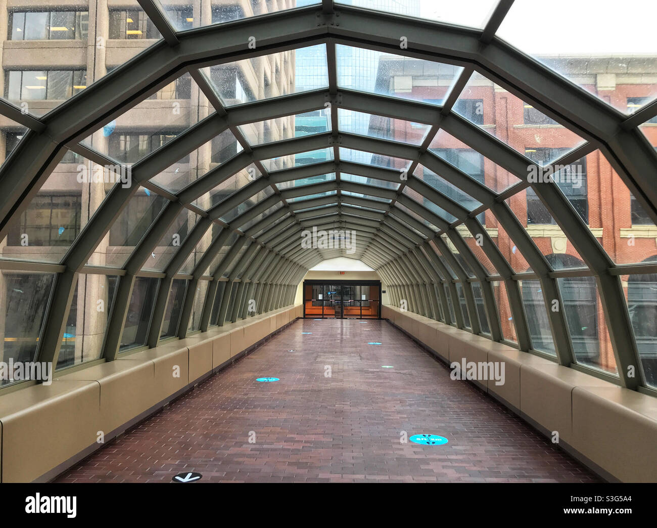 The Plus15 walkway system in downtown Calgary, Alberta, Canada, like a tunnel through a cobweb between buildings in the downtown core of the city. Stock Photo