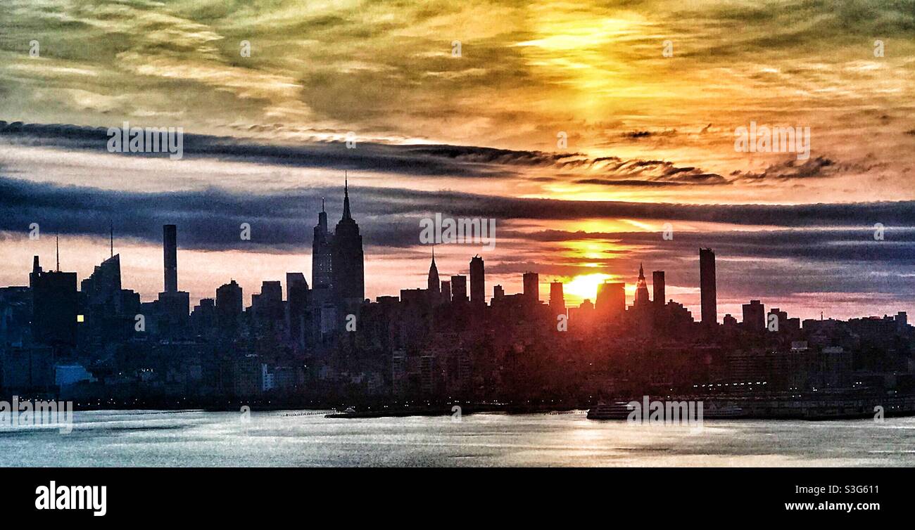 Dramatic sunrise over NYC skyline Stock Photo