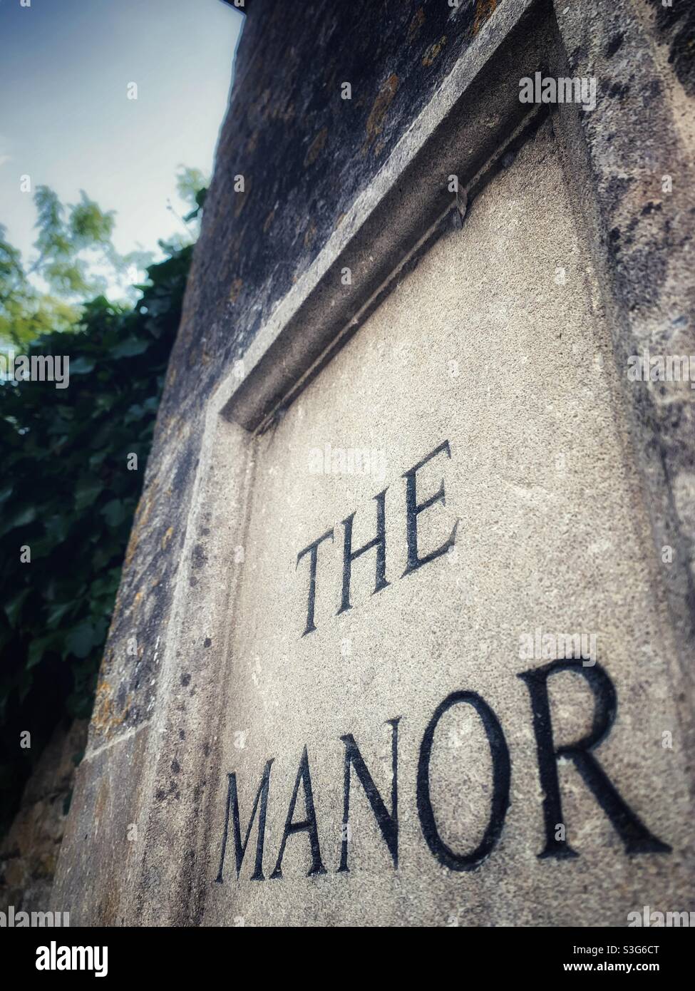 Beautiful carved typography in stone at the Manor House in Bourton on the Water Stock Photo