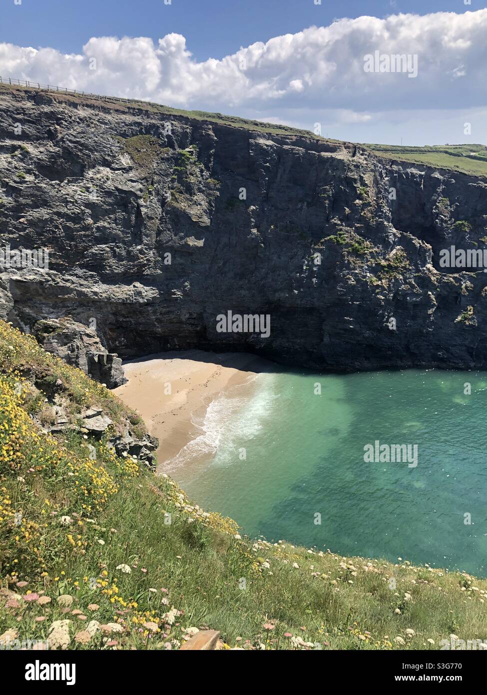 Hidden beach in Cornwall with turquoise sea Stock Photo